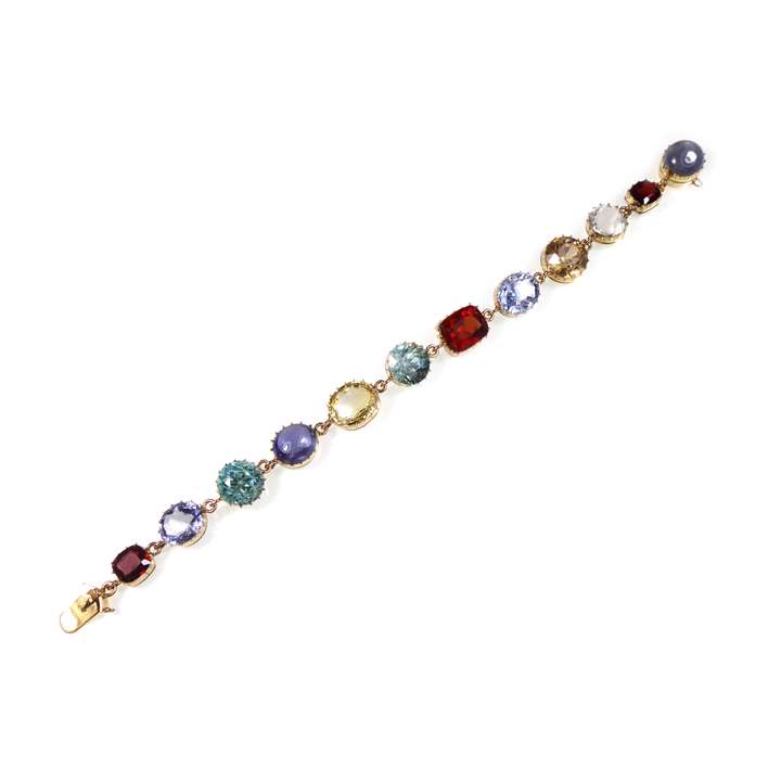 Vari-coloured gem and gold bracelet, open cut-down collet set with sapphires, garnets and zircons